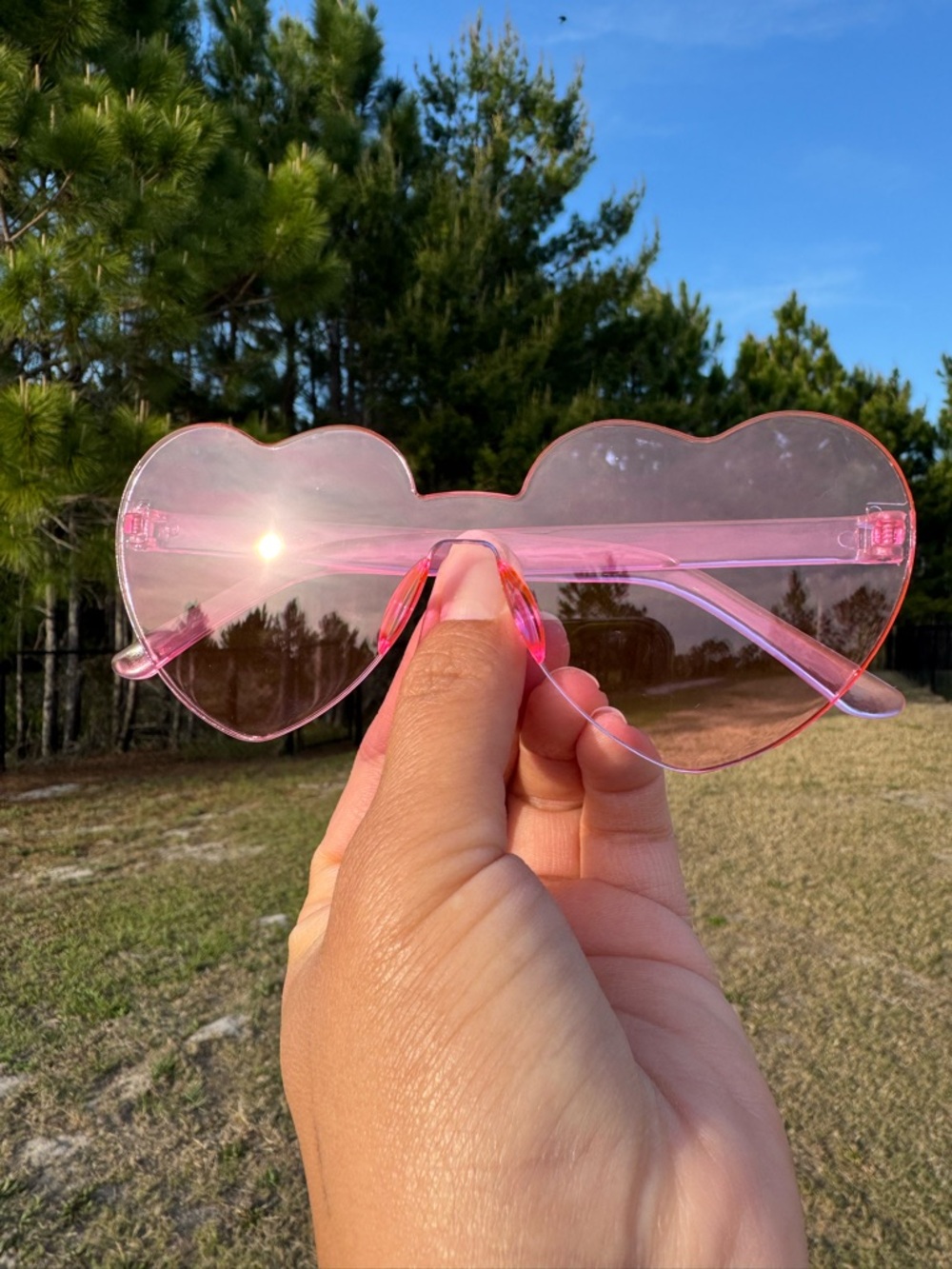 Pink Heart-Shaped Sunglasses - Transparent Pink Lenses